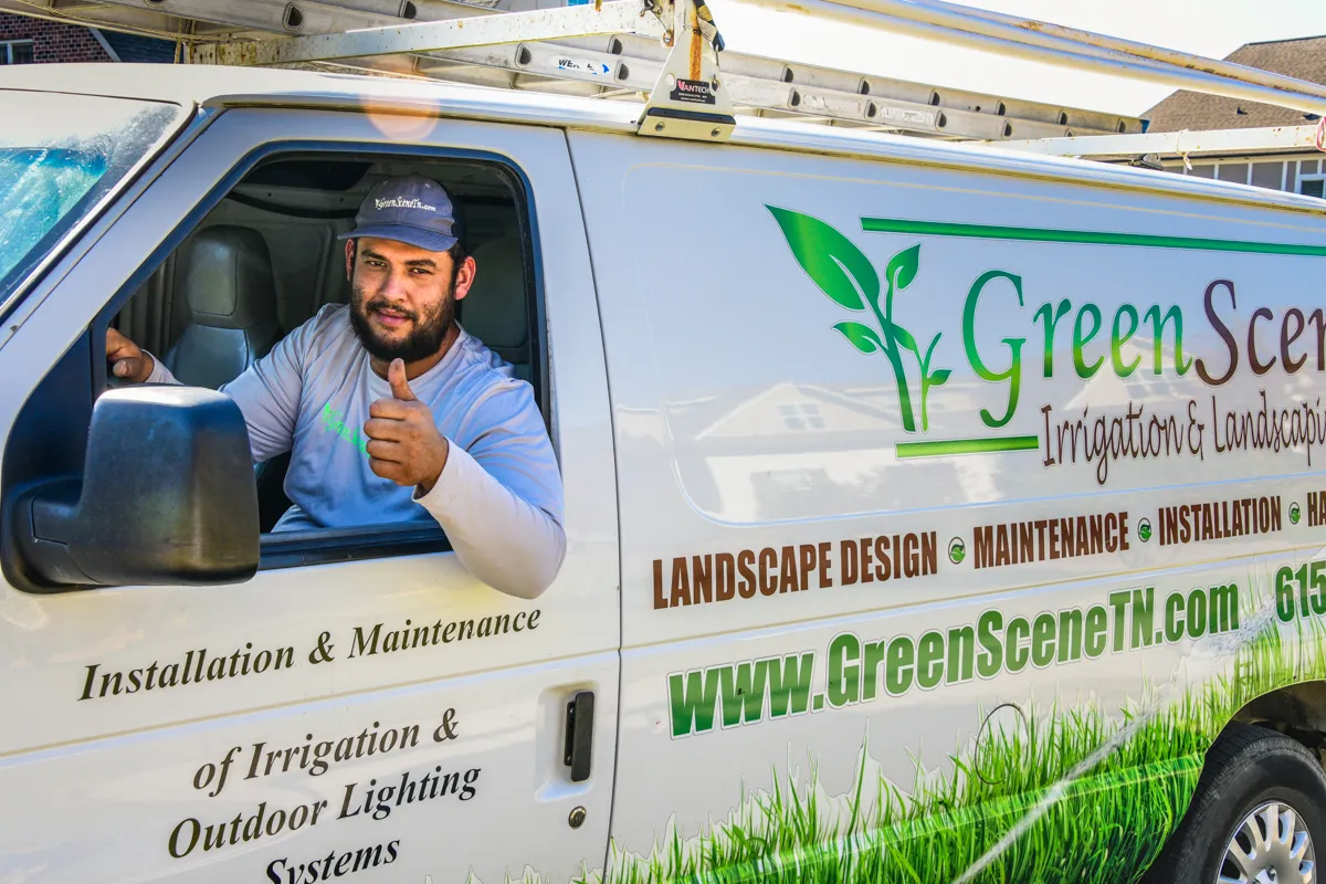 A Green Scene service van parked at a customer’s home