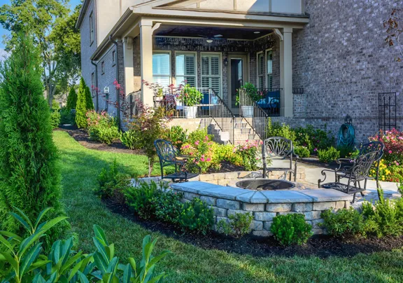 A paver patio looking out over a pool